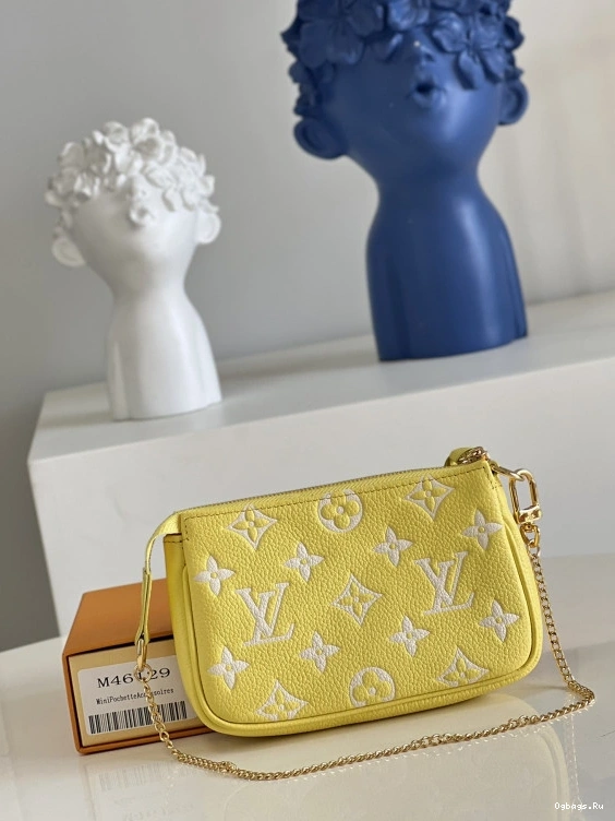 VUITTON POCHETTE ACCESSOIRES MINI LOUIS 0122